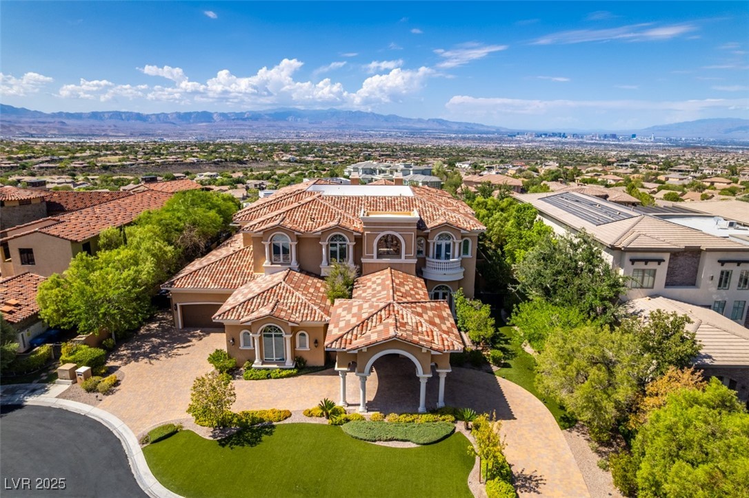 4 Awbrey Court Henderson, NV 89052 - Photo 66 of 72 Aerial view of residential area featuring a mountain backdrop