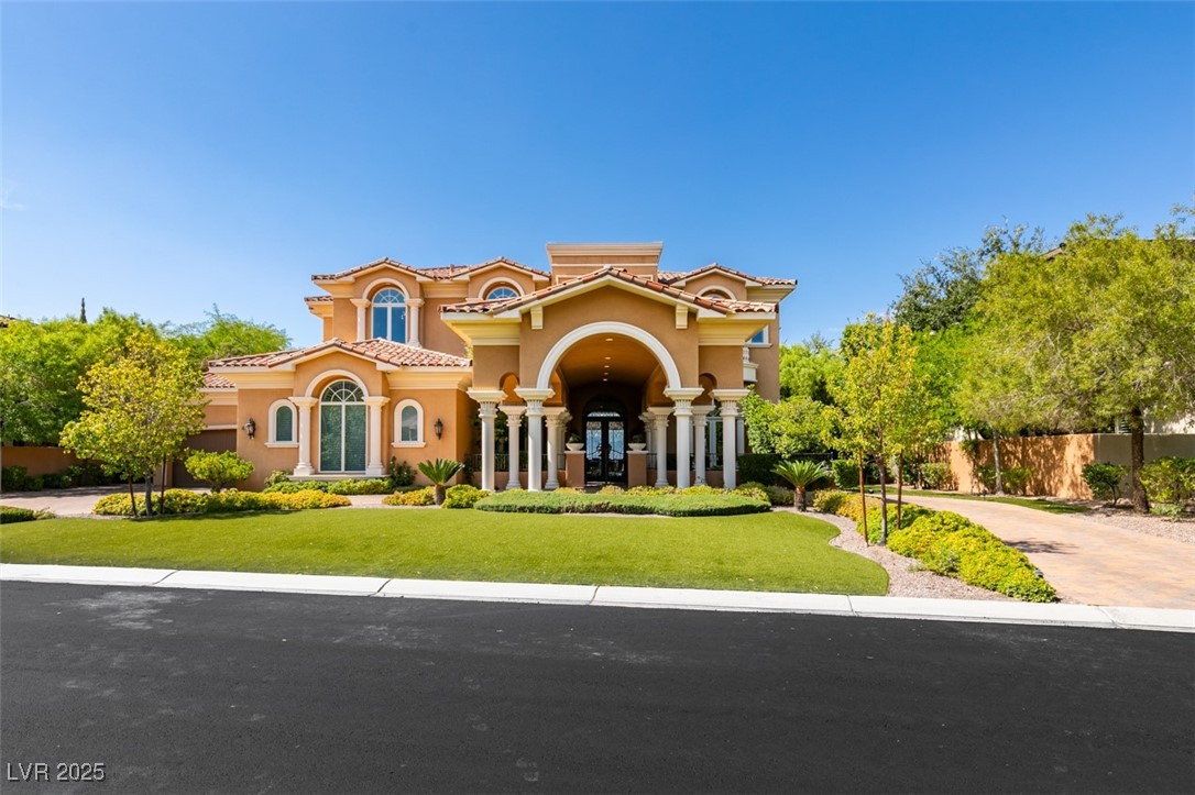4 Awbrey Court Henderson, NV 89052 - Photo 67 of 72 Mediterranean / spanish home with a tile roof, stucco siding, and driveway