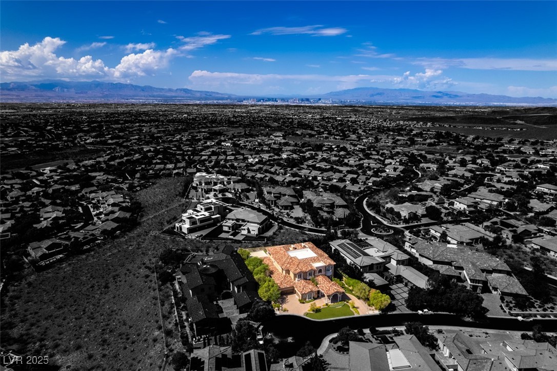 4 Awbrey Court Henderson, NV 89052 - Photo 72 of 72 Aerial perspective of suburban area with a mountain backdrop