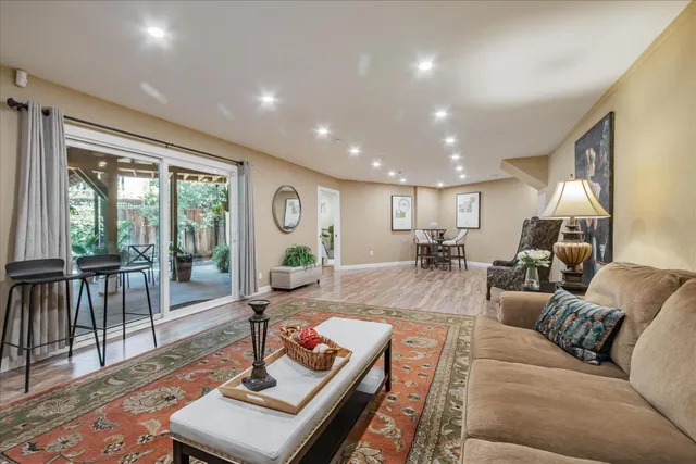 a living room with furniture and a table