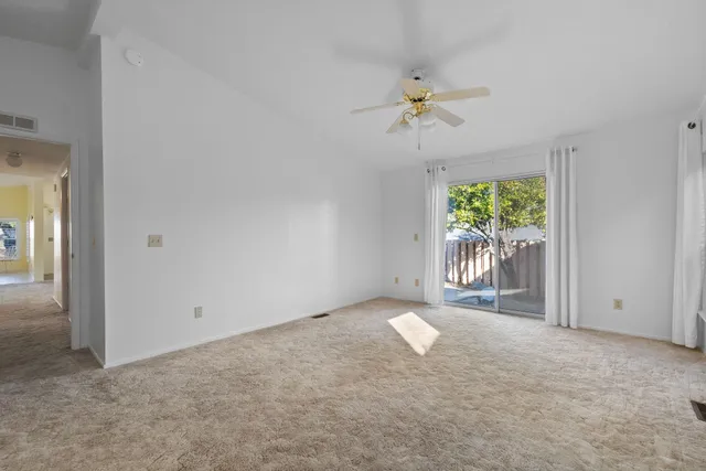 a bathroom with a tub and a window
