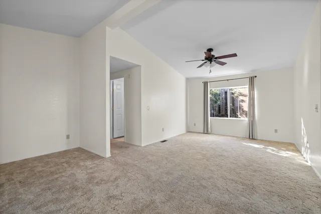 a view of an empty room with window