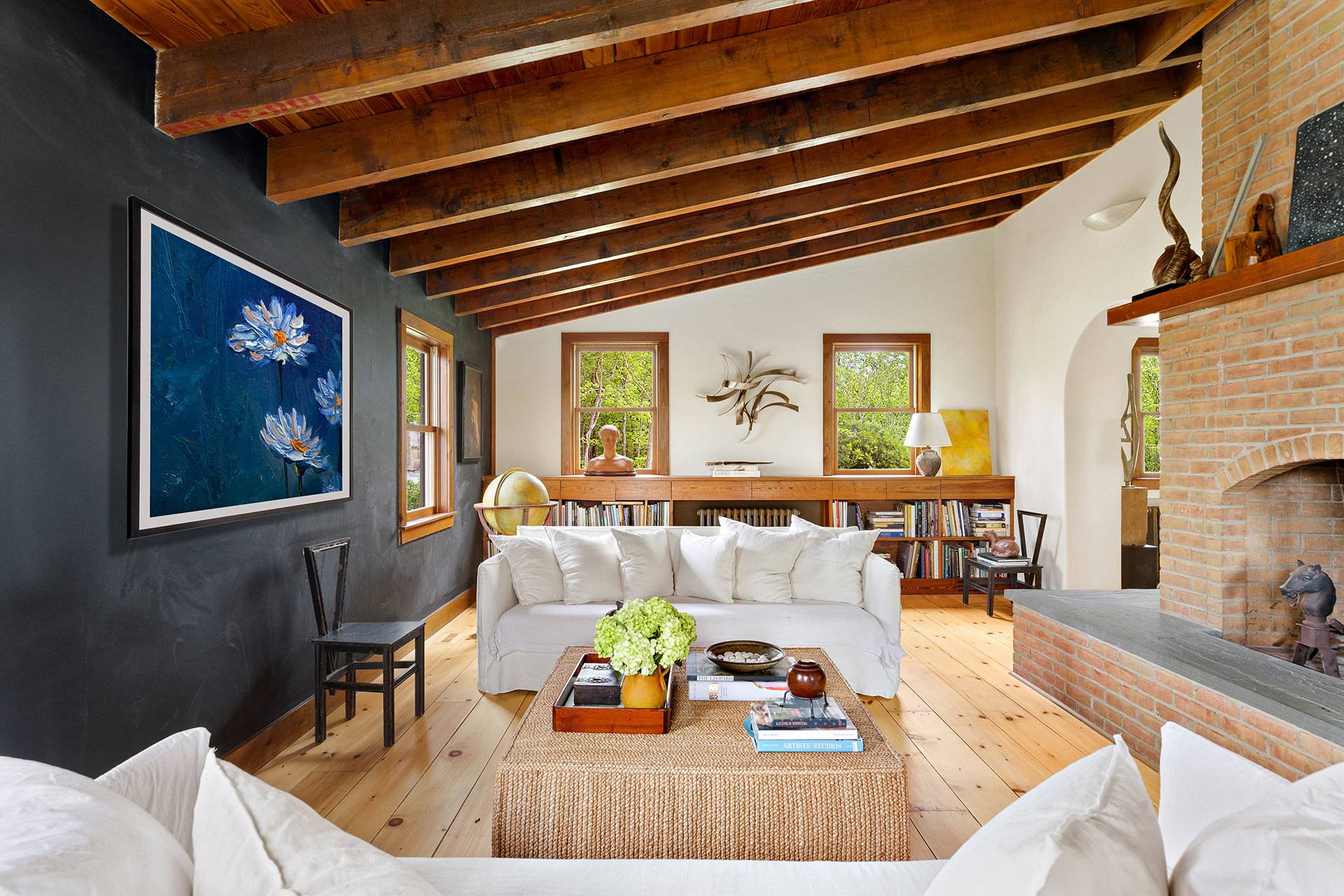 a living room with furniture and a table