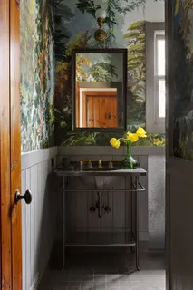 a living room with furniture a large window with outer view