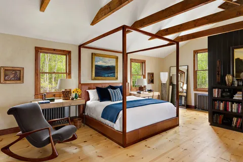 a living room with furniture flat screen tv and a fireplace