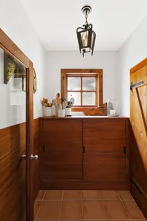 a view of a park with swings and slides