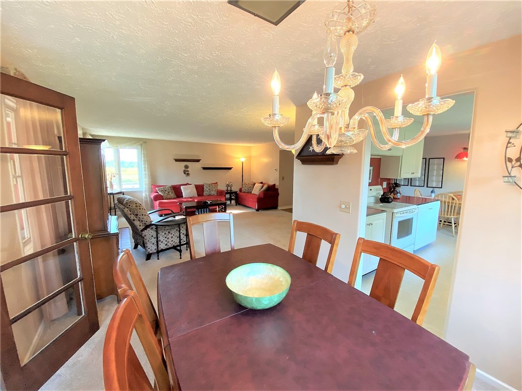 1560 Westfall Road Brighton, NY 14618 - Photo 12 of 40 Just inside the sun porch, a dining area off the k