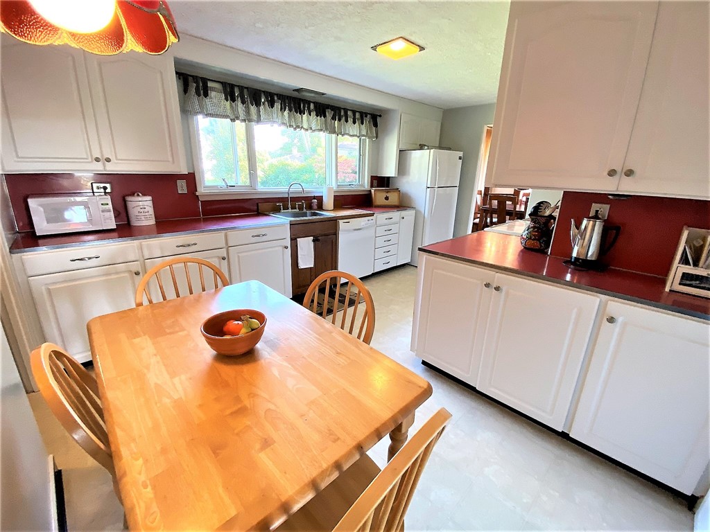 1560 Westfall Road Brighton, NY 14618 - Photo 17 of 40 Enjoy a light filled space while prepping meals fo