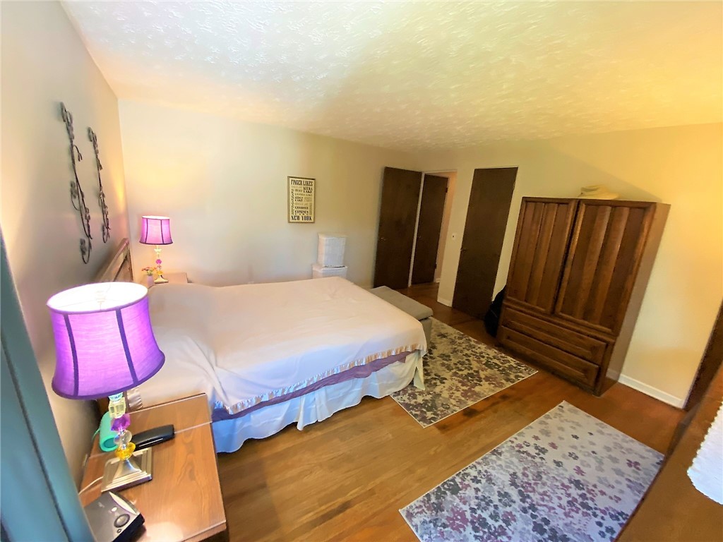 1560 Westfall Road Brighton, NY 14618 - Photo 23 of 40 Beautiful floors and cream colored walls, move rig