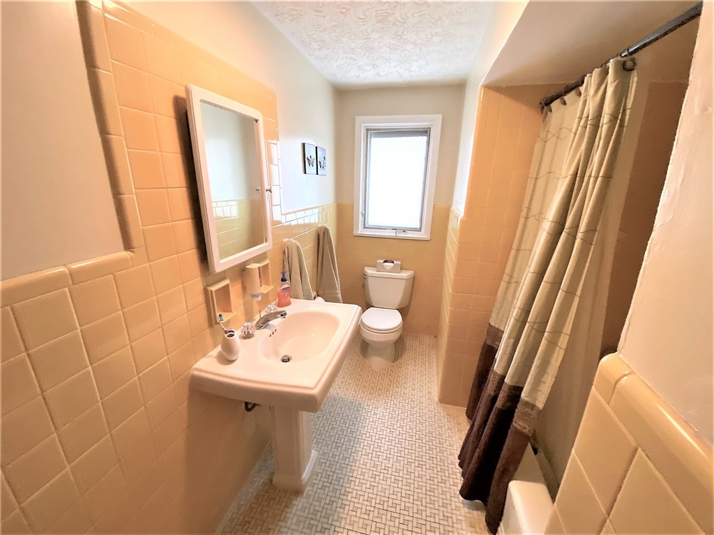 1560 Westfall Road Brighton, NY 14618 - Photo 27 of 40 A charming full bath with all original tile!