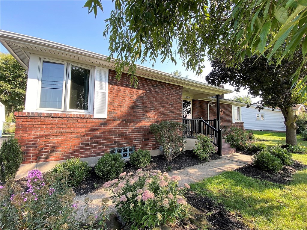 1560 Westfall Road Brighton, NY 14618 - Photo 3 of 40 Sit a spell on your front stoop under the ever cha