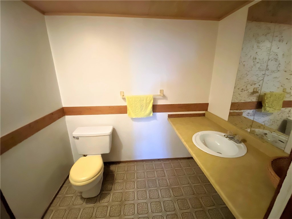 1560 Westfall Road Brighton, NY 14618 - Photo 31 of 40 A half bath in the basement, super convenient for