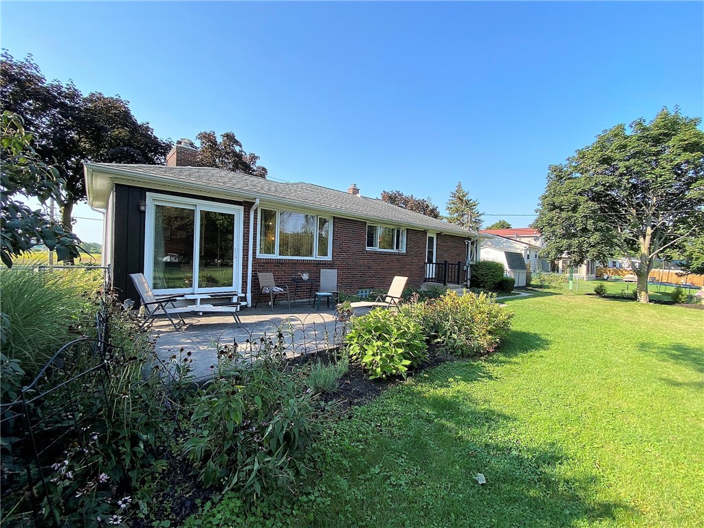 1560 Westfall Road Brighton, NY 14618 - Photo 38 of 40 Set up the BBQ right off the sunroom on the patio