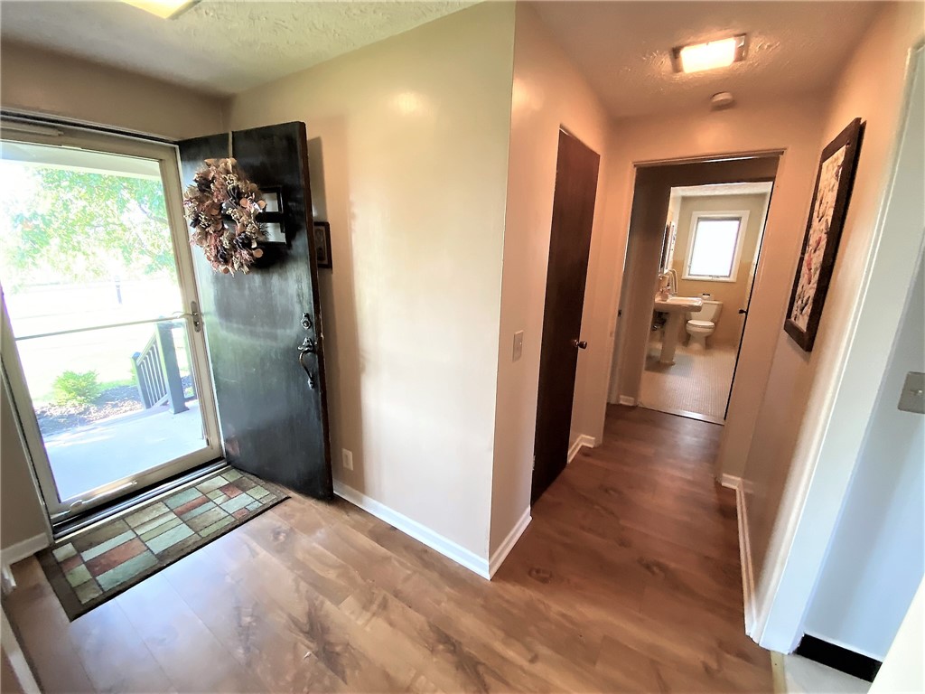 1560 Westfall Road Brighton, NY 14618 - Photo 7 of 40 An inviting space leads that leads you through a c