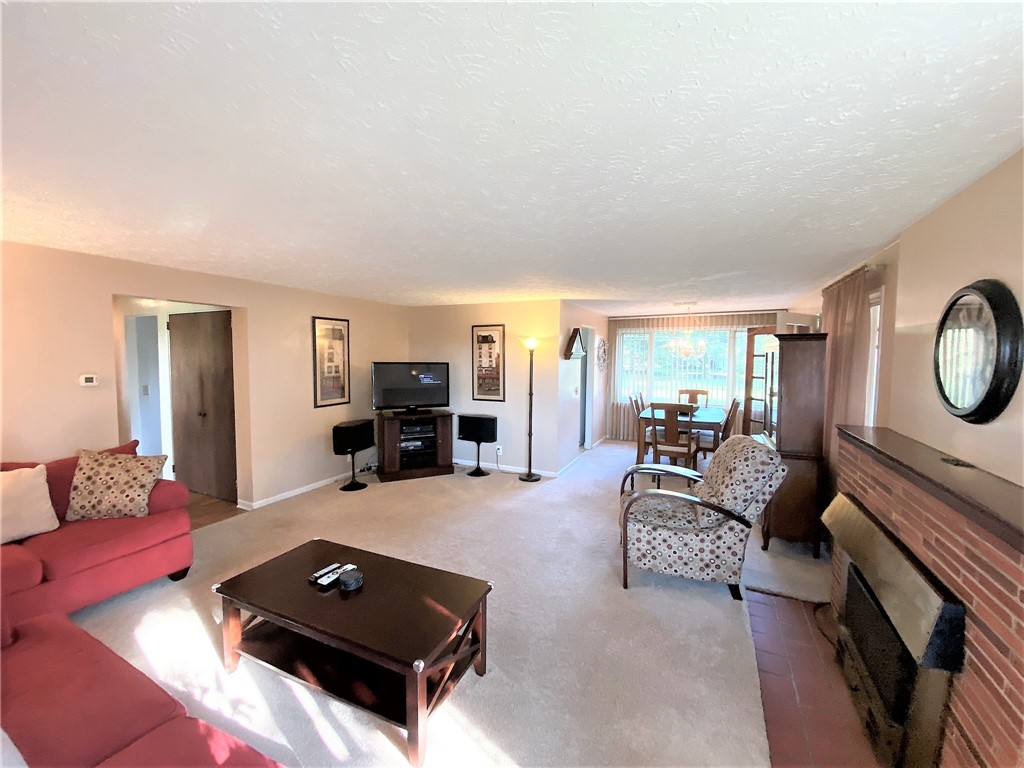 1560 Westfall Road Brighton, NY 14618 - Photo 9 of 40 A grand entertaining space with wall-to-wall carpe