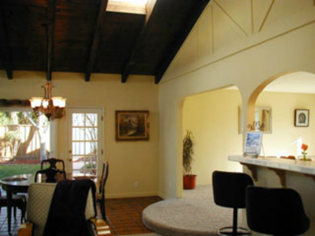 4807 Rue Nice Court San Jose, CA 95136 - Photo 12 of 16 a living room with furniture and a chandelier