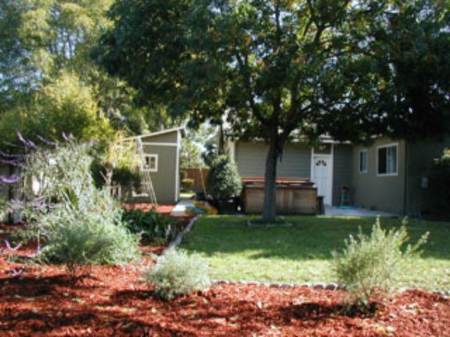 4807 Rue Nice Court San Jose, CA 95136 - Photo 5 of 16 a front view of a house with garden