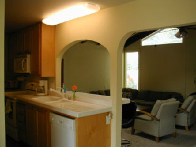 4807 Rue Nice Court San Jose, CA 95136 - Photo 10 of 16 a en suite bathroom with a granite countertop sink and a mirror