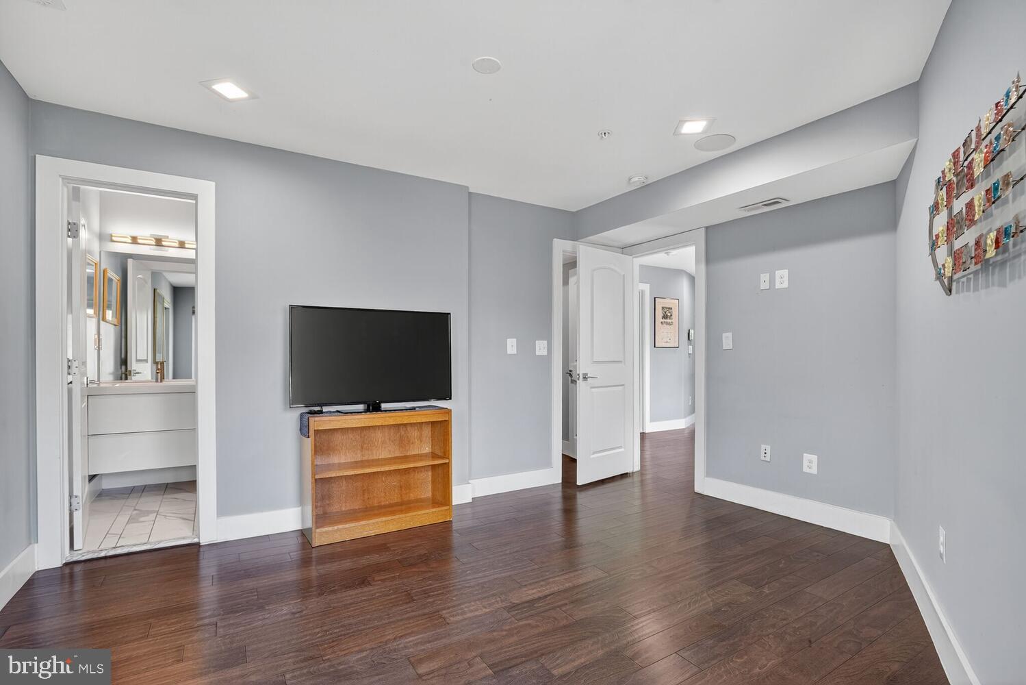 5700 Blair Road Northeast Washington, DC 20011 - Photo 21 of 45 a living room with hard wood floors and a flat screen tv