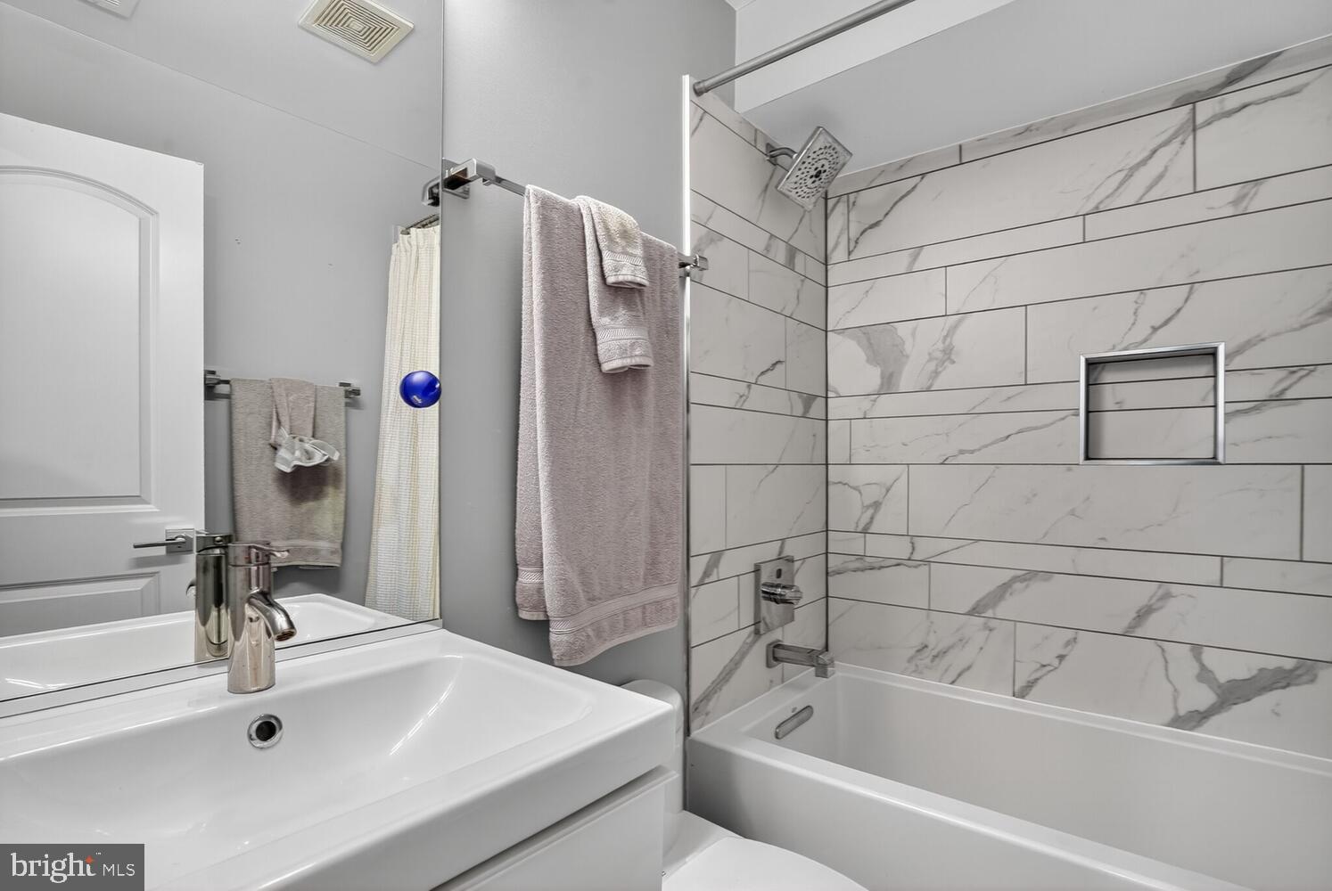 5700 Blair Road Northeast Washington, DC 20011 - Photo 39 of 45 a bathroom with a sink and a tub