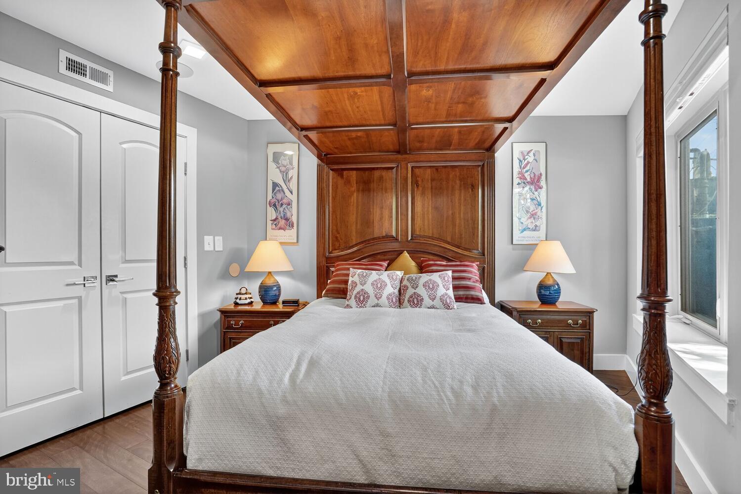 5700 Blair Road Northeast Washington, DC 20011 - Photo 40 of 45 a bedroom with a bed and wooden floor