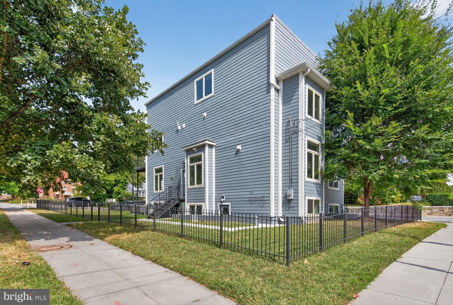 5700 Blair Road Northeast Washington, DC 20011 - Photo 45 of 45 a view of a house with a yard and plants