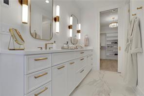 343 Sugarview Road Sugar Hill, GA 30518 - Photo 19 of 40 a bathroom with a double vanity sink mirror and