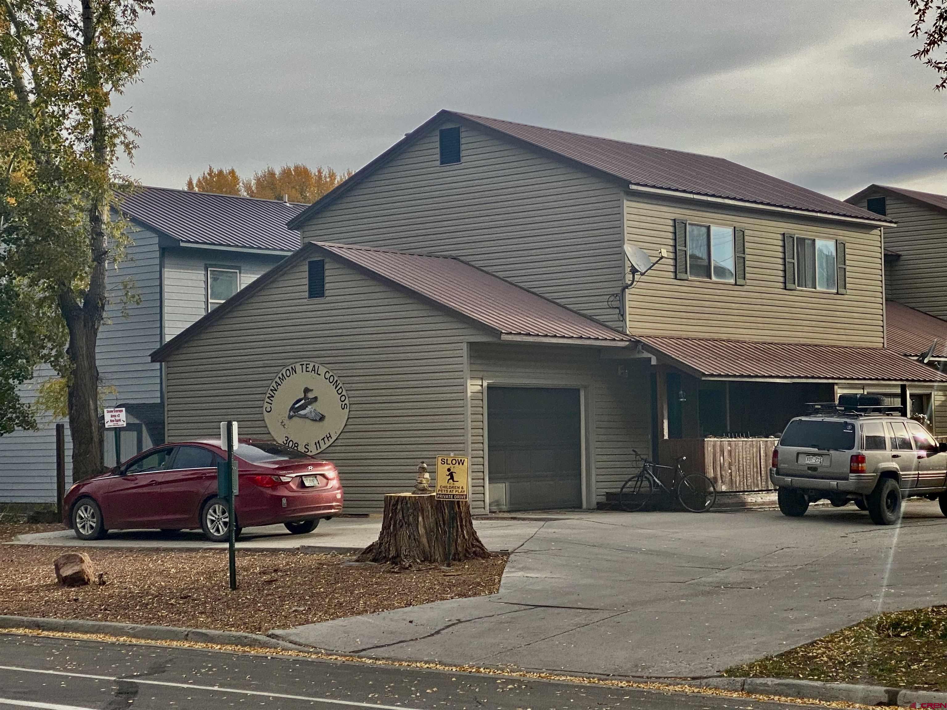 a car parked in front of a house
