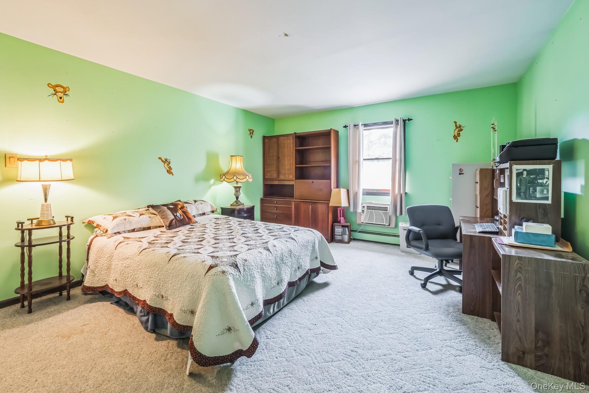 24 New Road Milton, NY 12547 - Photo 12 of 30 a bedroom with a bed gym equipment and a large window