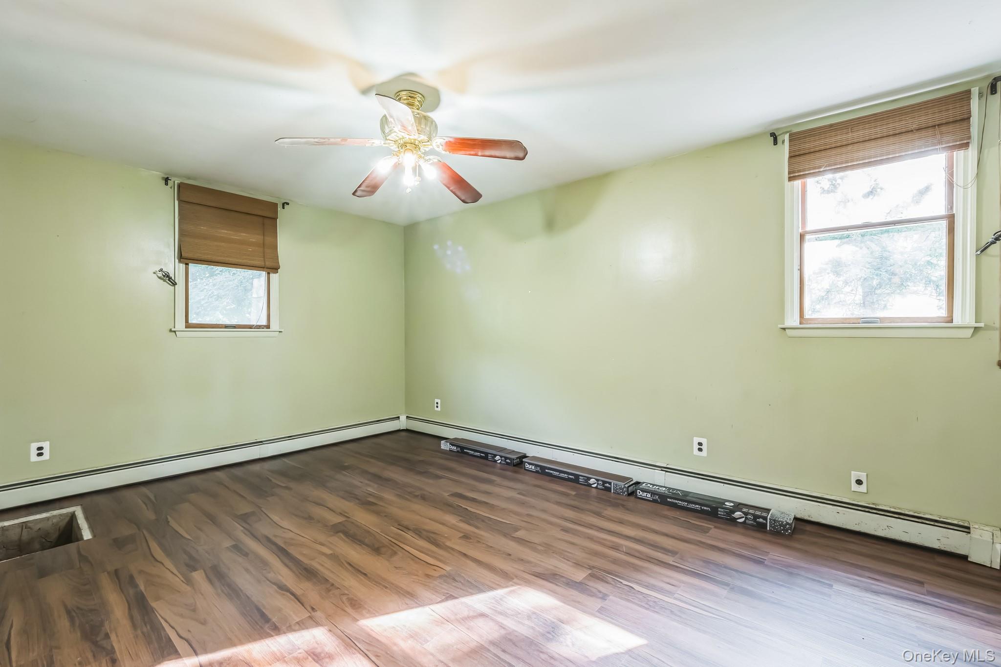 24 New Road Milton, NY 12547 - Photo 18 of 30 an empty room with a window and ceiling fan