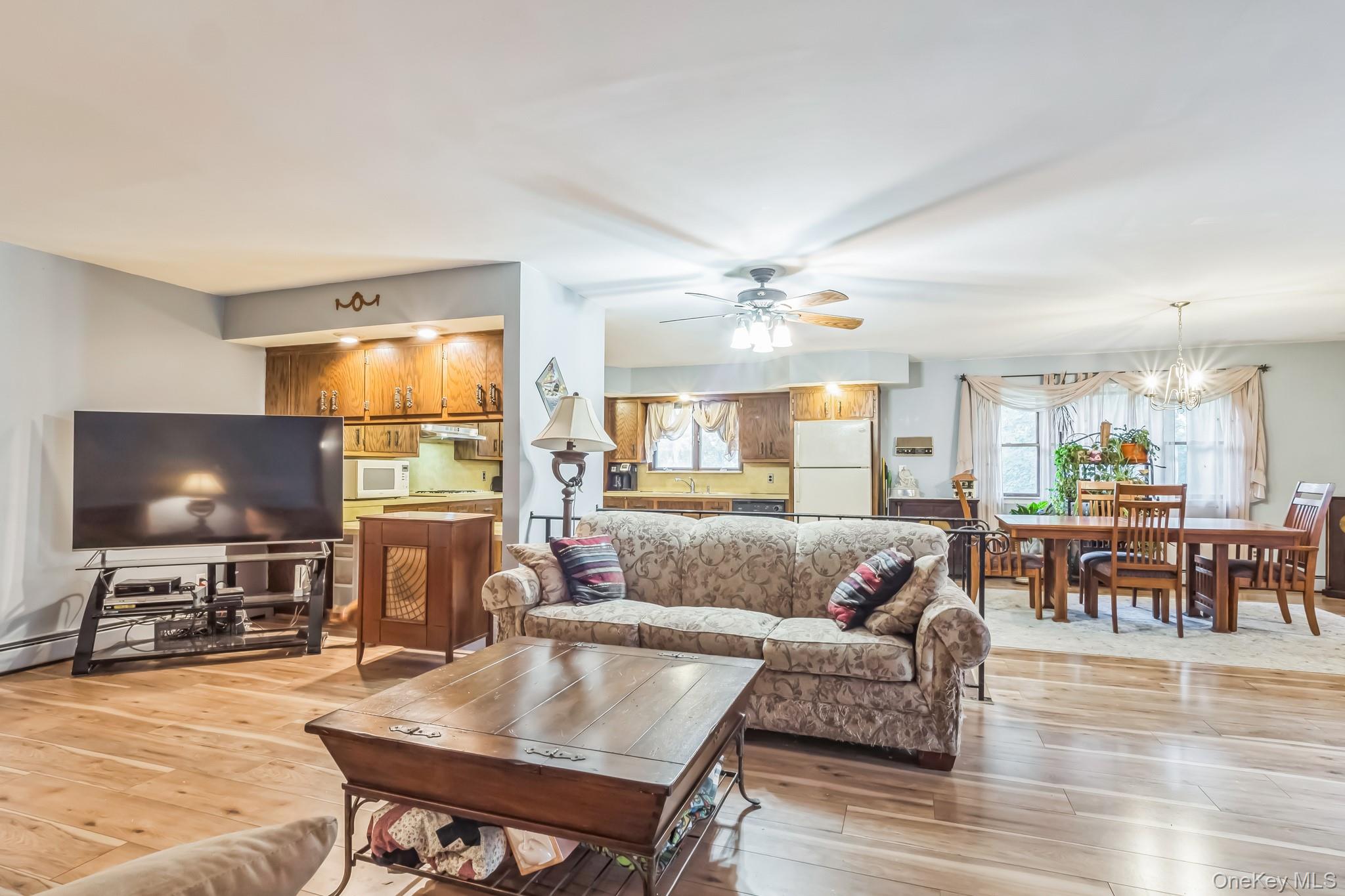 24 New Road Milton, NY 12547 - Photo 19 of 30 a living room with furniture and a flat screen tv