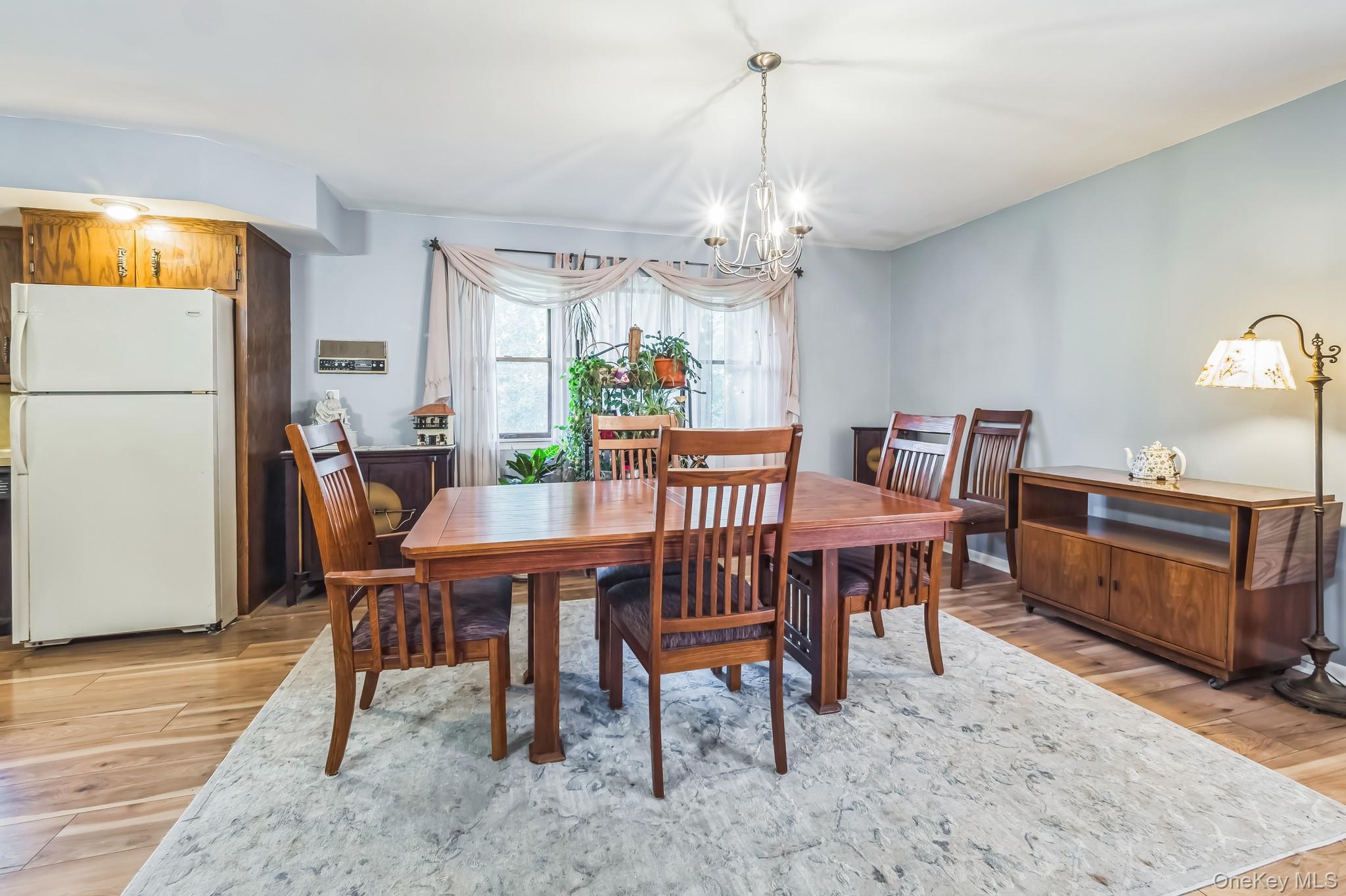 24 New Road Milton, NY 12547 - Photo 22 of 30 a view of a dining room with furniture window and wooden floor