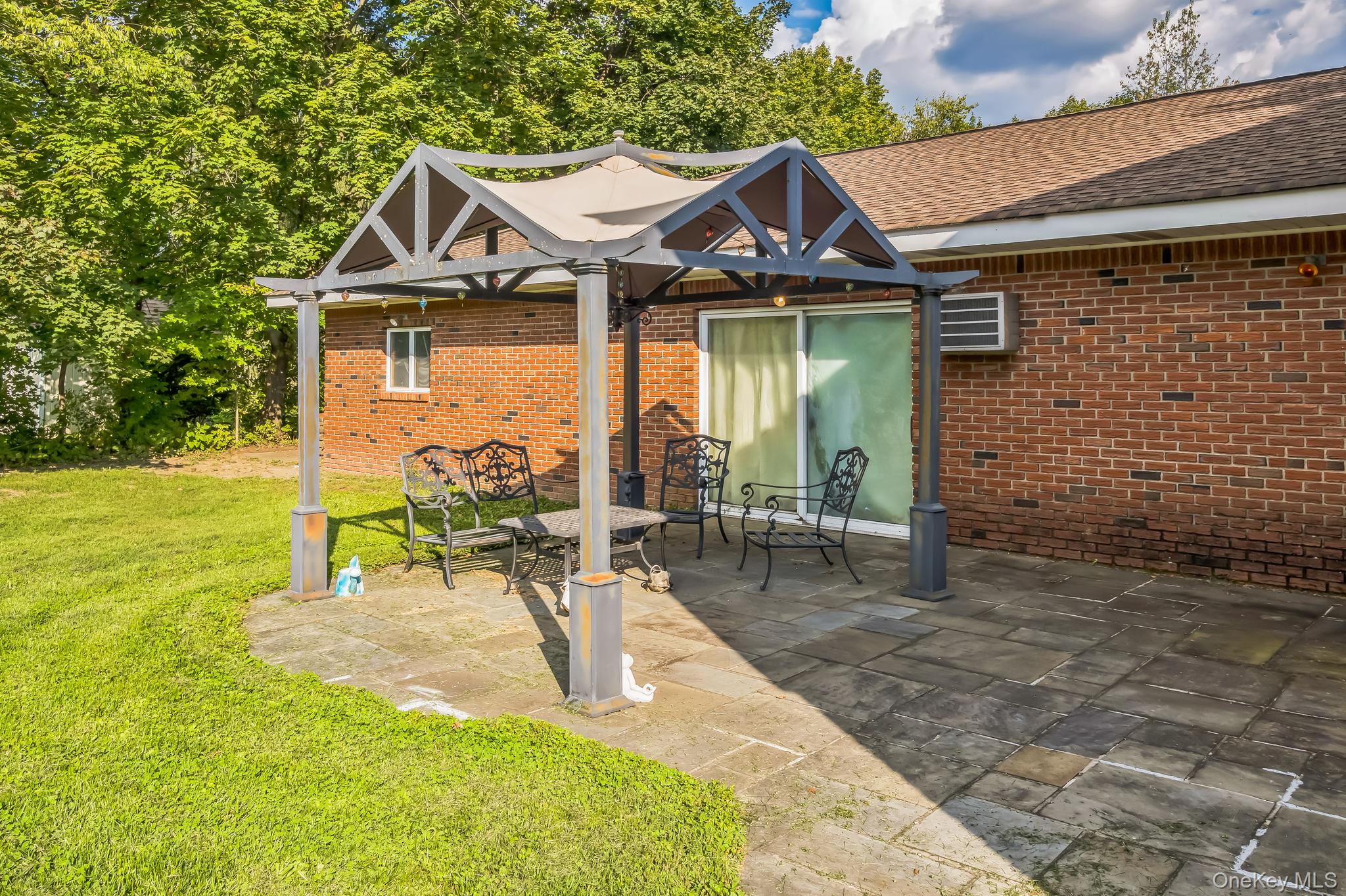 24 New Road Milton, NY 12547 - Photo 3 of 30 a front view of a house with garden