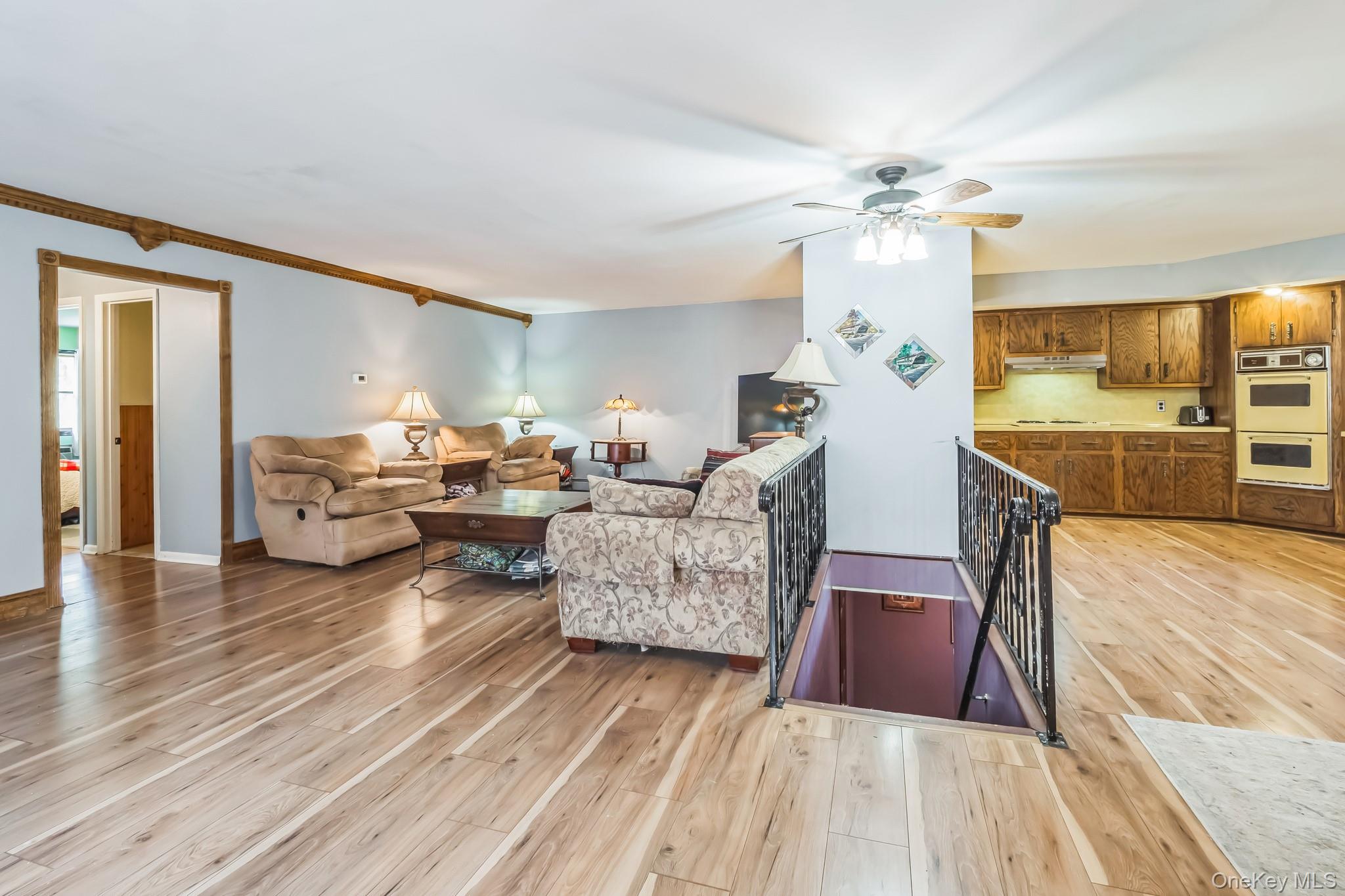 24 New Road Milton, NY 12547 - Photo 6 of 30 a living room with furniture and a wooden floor