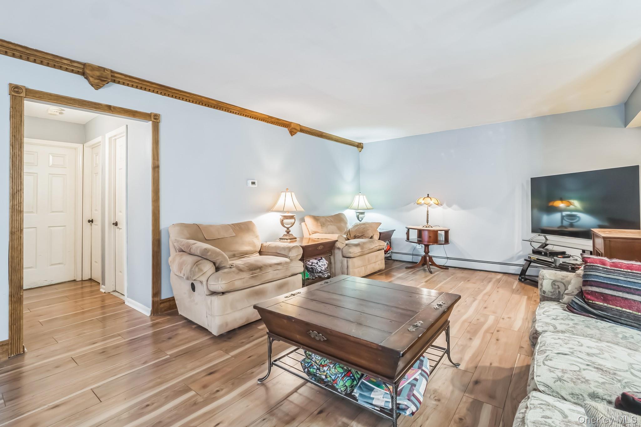 24 New Road Milton, NY 12547 - Photo 8 of 30 a living room with furniture and a flat screen tv