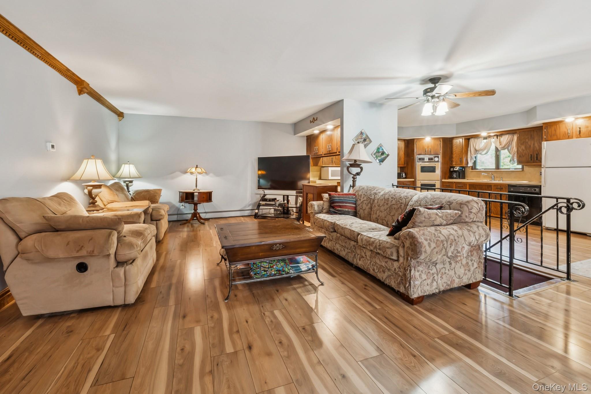 24 New Road Milton, NY 12547 - Photo 9 of 30 a living room with furniture and a wooden floor
