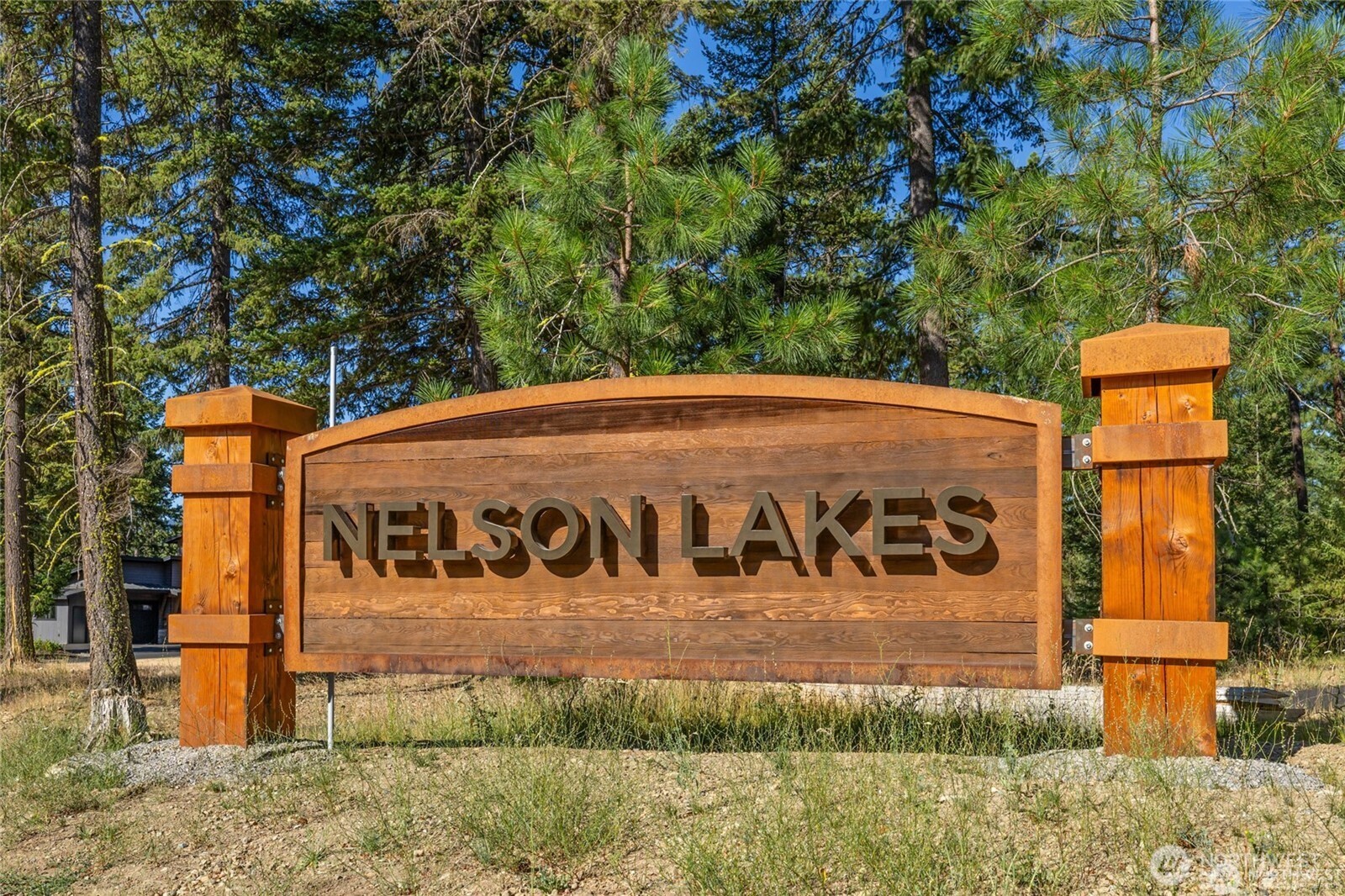 114 Wanawish Loop Cle Elum, WA 98922 - Photo 2 of 6 a sign that is on the side of a road