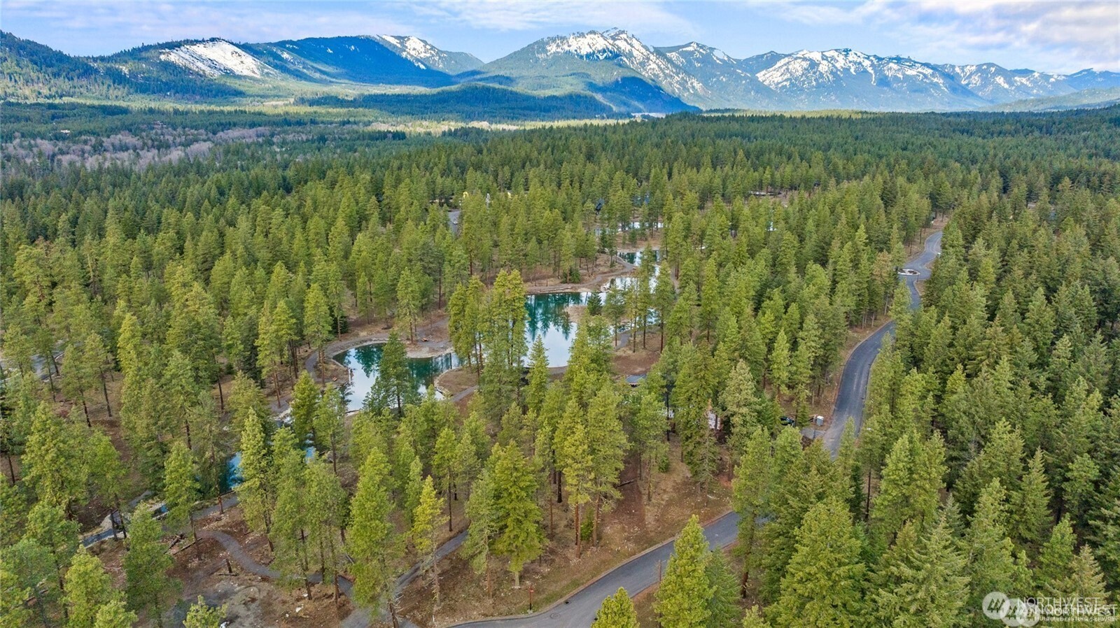 114 Wanawish Loop Cle Elum, WA 98922 - Photo 4 of 6 a view of a lake with an outdoor space