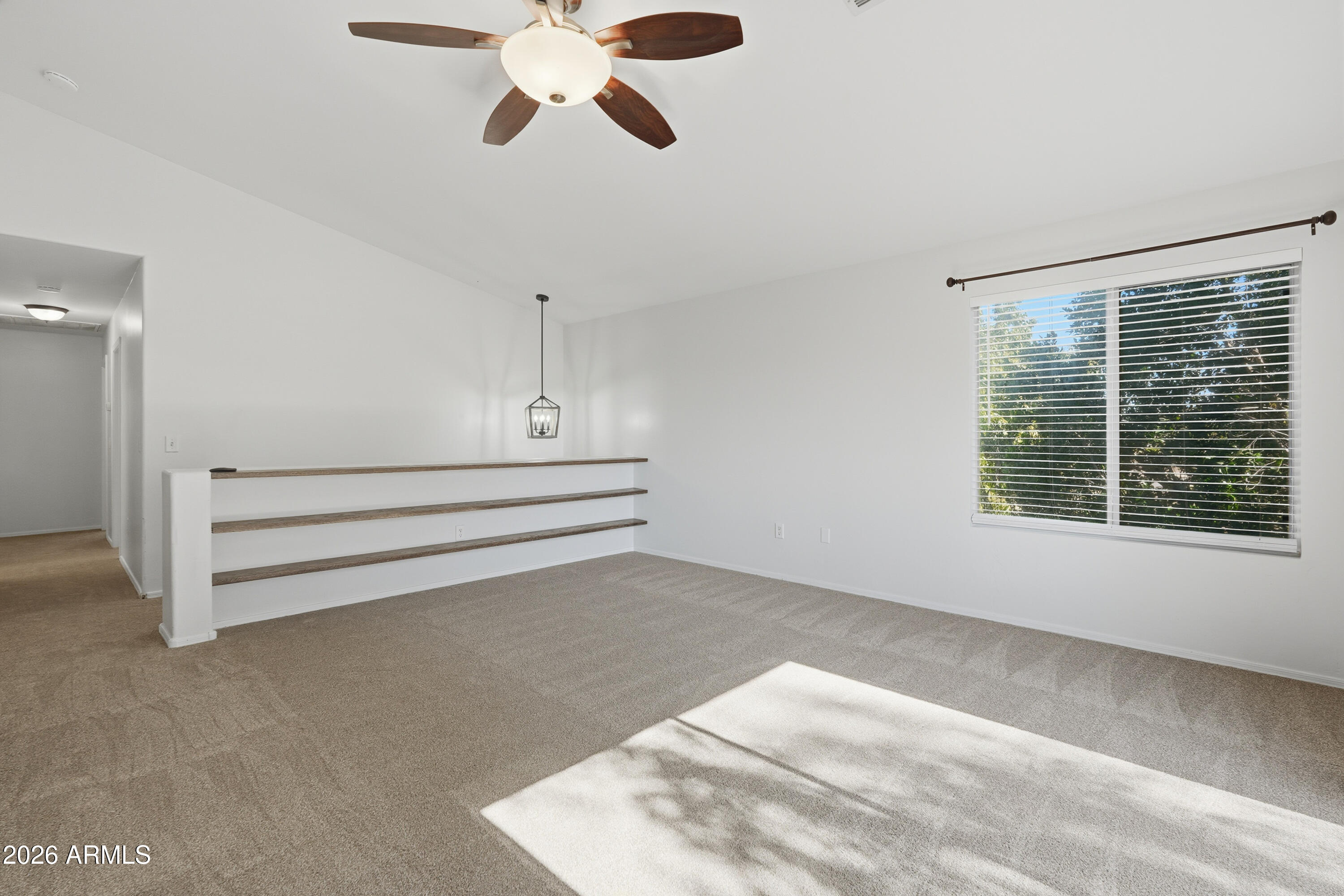 2497 East Ivanhoe Court Gilbert, AZ 85295 - Photo 19 of 57 a view of an empty room with a window