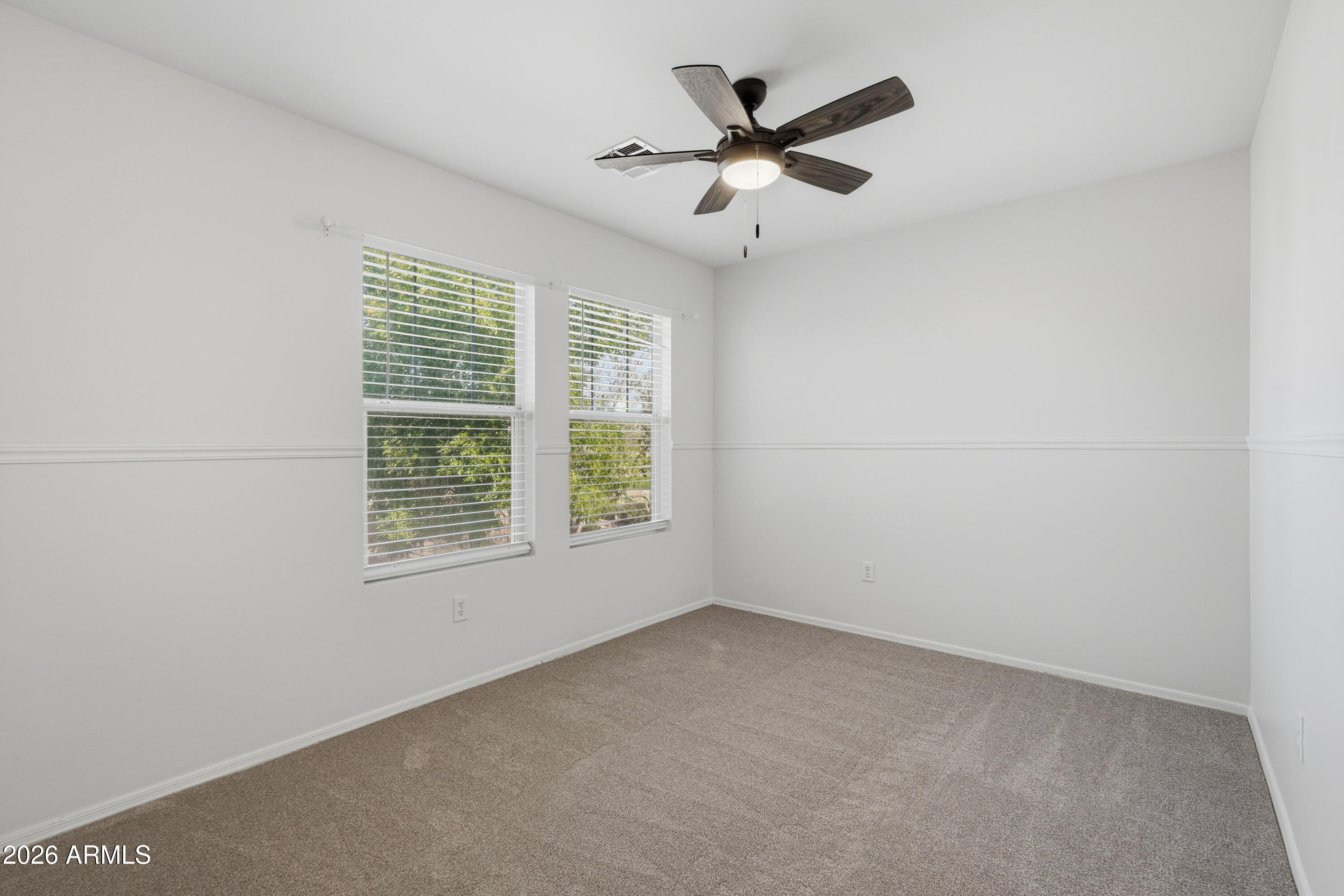 2497 East Ivanhoe Court Gilbert, AZ 85295 - Photo 25 of 57 an empty room with a window