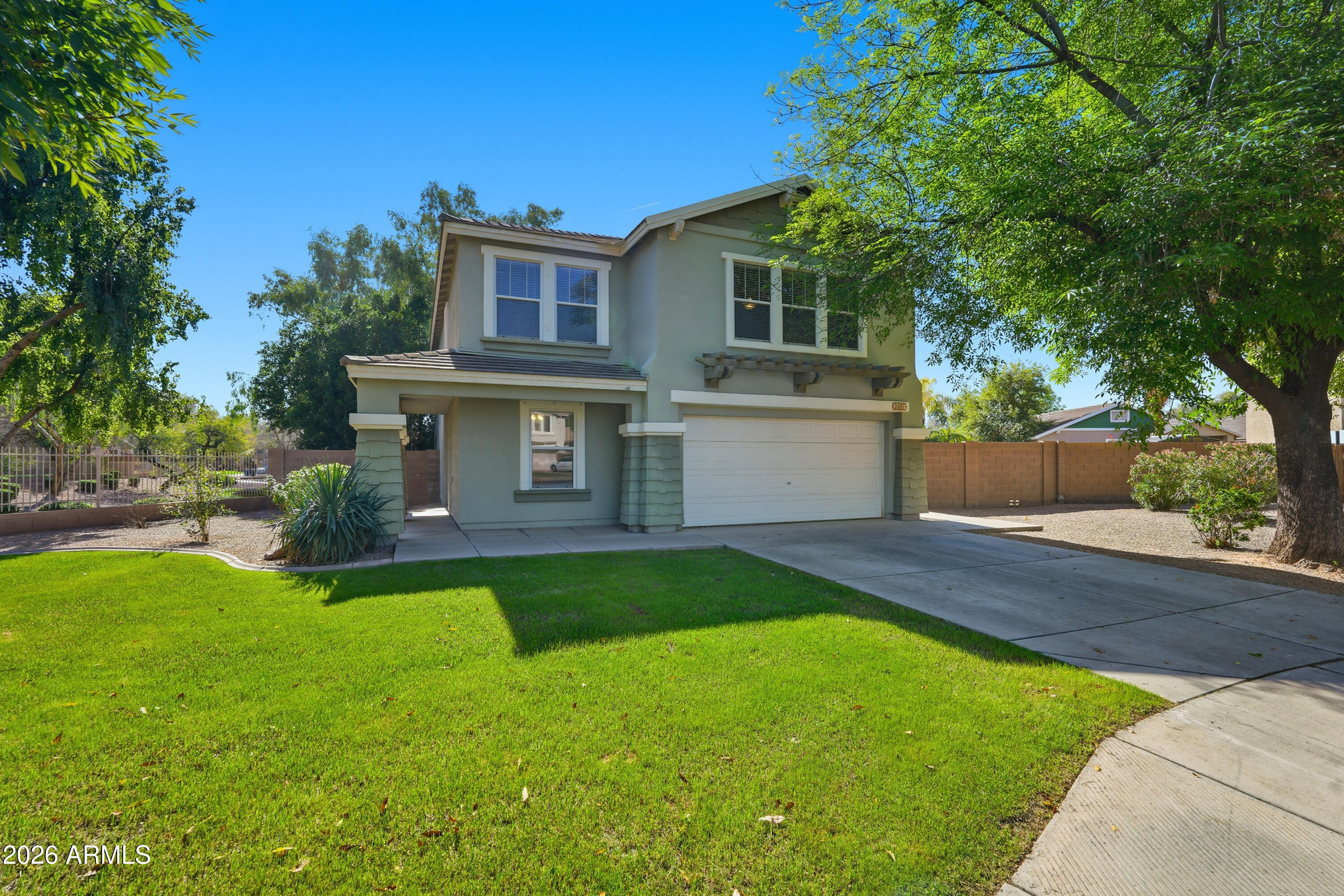 2497 East Ivanhoe Court Gilbert, AZ 85295 - Photo 3 of 57 front view of a house with a yard