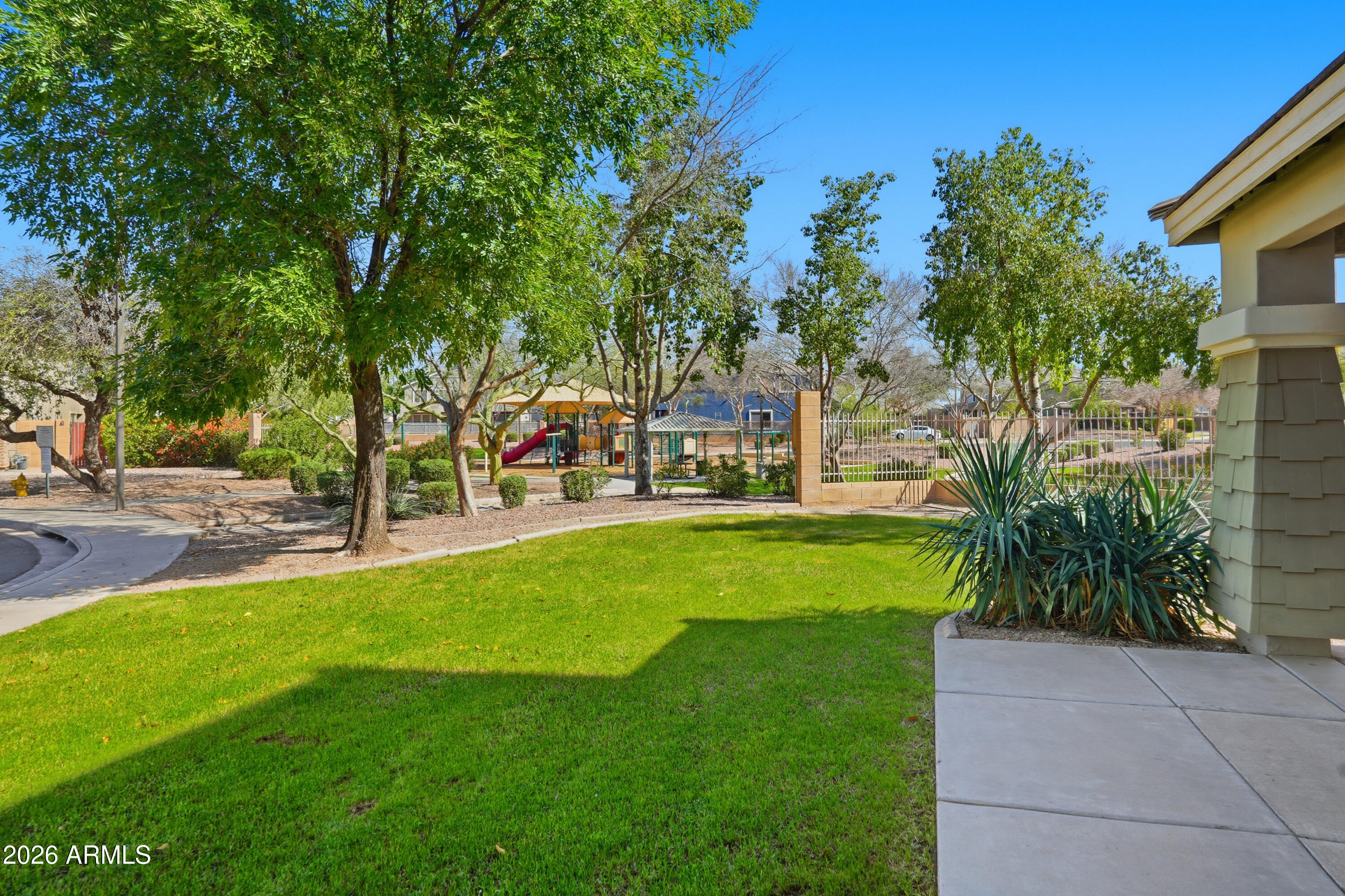 2497 East Ivanhoe Court Gilbert, AZ 85295 - Photo 40 of 57 a view of yard with swimming pool and sitting area