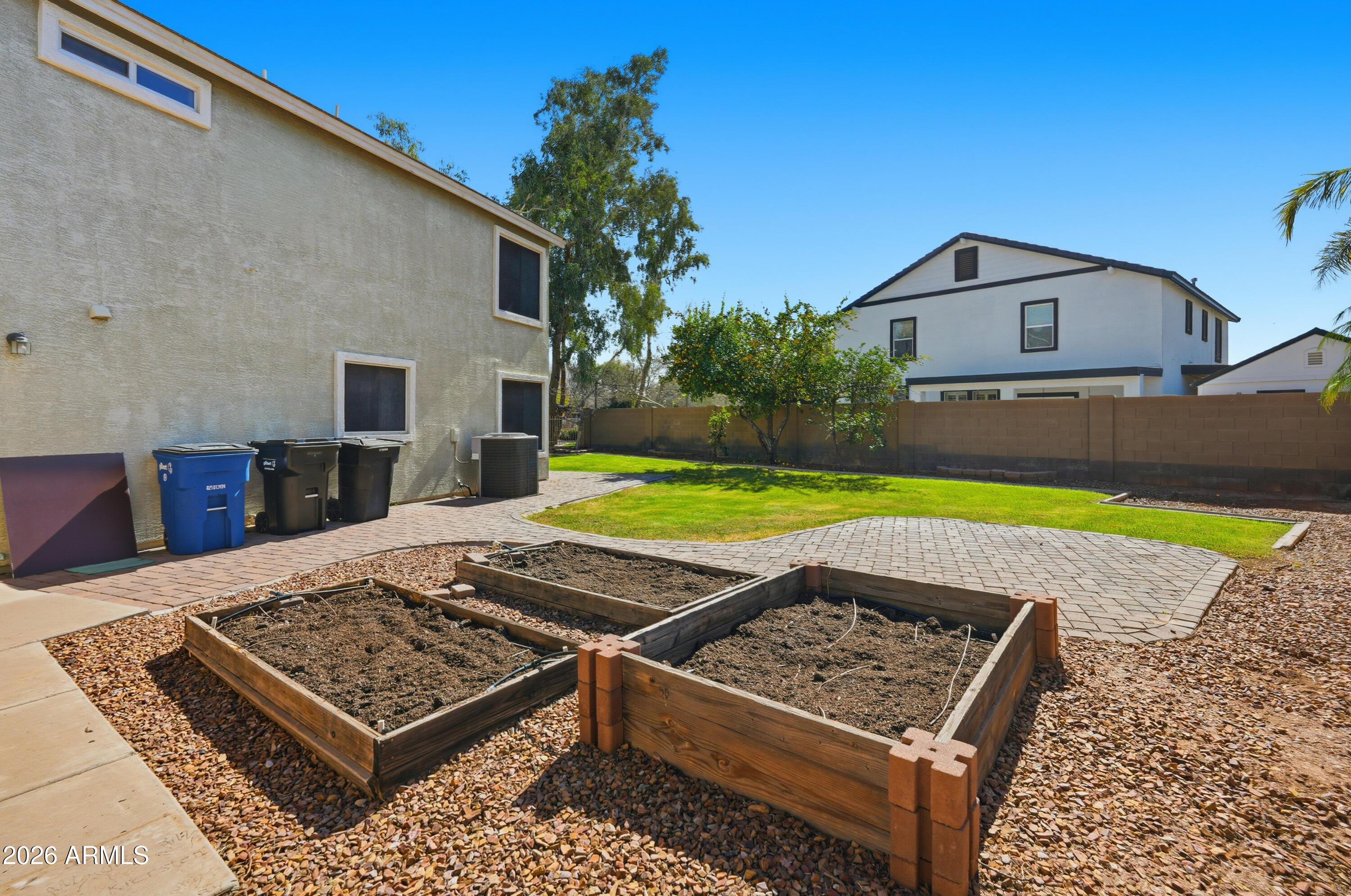 2497 East Ivanhoe Court Gilbert, AZ 85295 - Photo 48 of 57 a view of a mini refrigerator in a yard