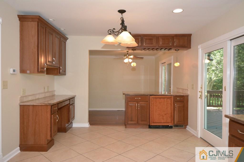 2 Taylor Road Princeton, NJ 08540 - Photo 11 of 25 a spacious bathroom with a granite countertop sink a mirror and a shower
