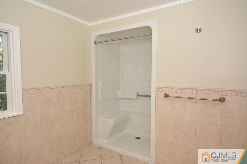 2 Taylor Road Princeton, NJ 08540 - Photo 13 of 25 a bathroom with a glass shower door