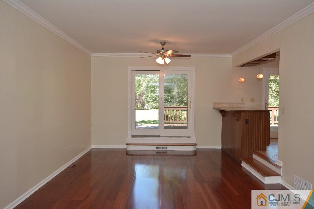 2 Taylor Road Princeton, NJ 08540 - Photo 6 of 25 a view of empty room with wooden floor and fan
