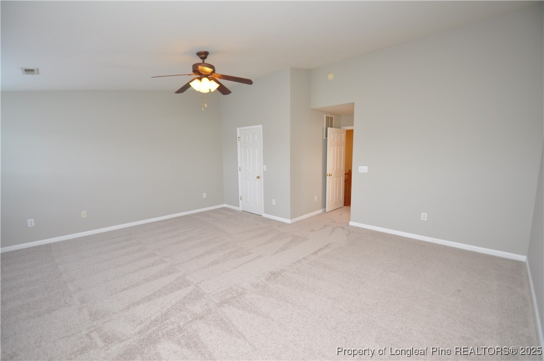 8600 Neuse Landing Lane, Unit 101 Raleigh, NC 27616 - Photo 25 of 29 a view of empty room with wooden floor