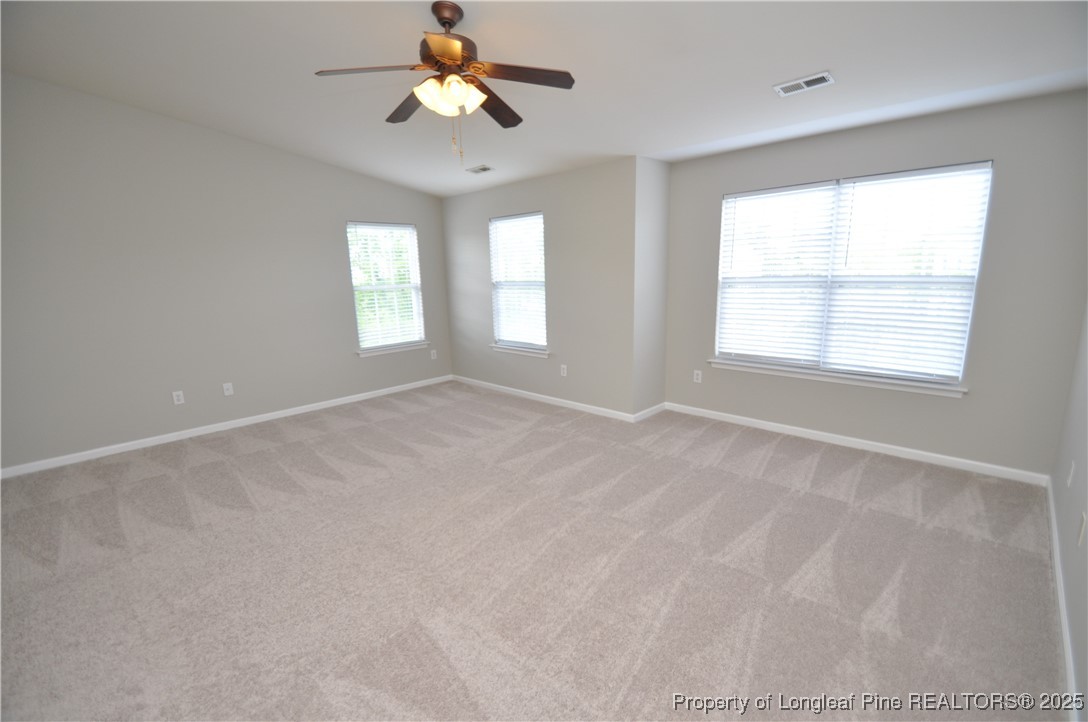 8600 Neuse Landing Lane, Unit 101 Raleigh, NC 27616 - Photo 27 of 29 a view of an empty room with a window