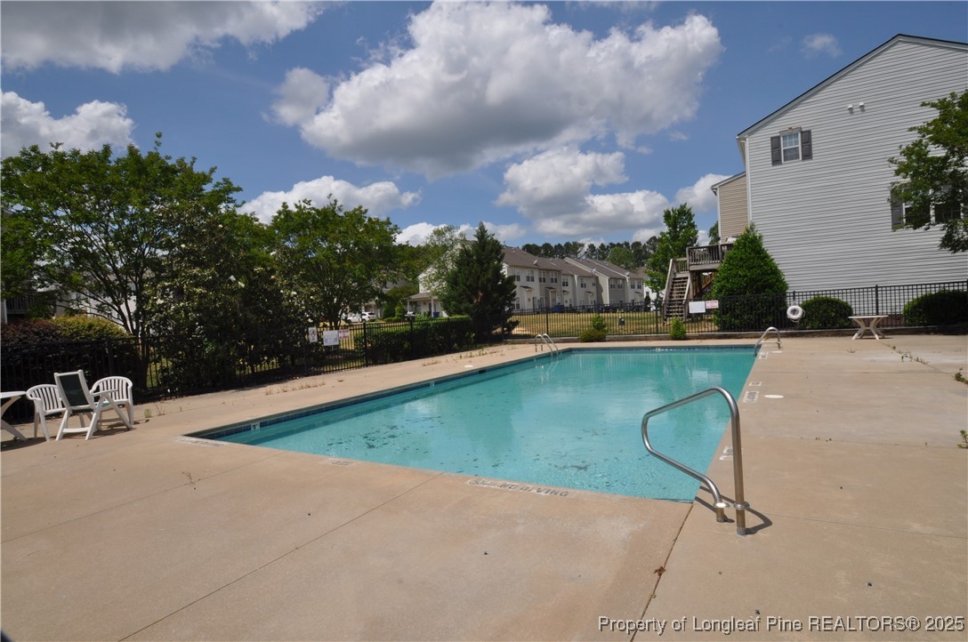 8600 Neuse Landing Lane, Unit 101 Raleigh, NC 27616 - Photo 29 of 29 swimming pool view with a outdoor space