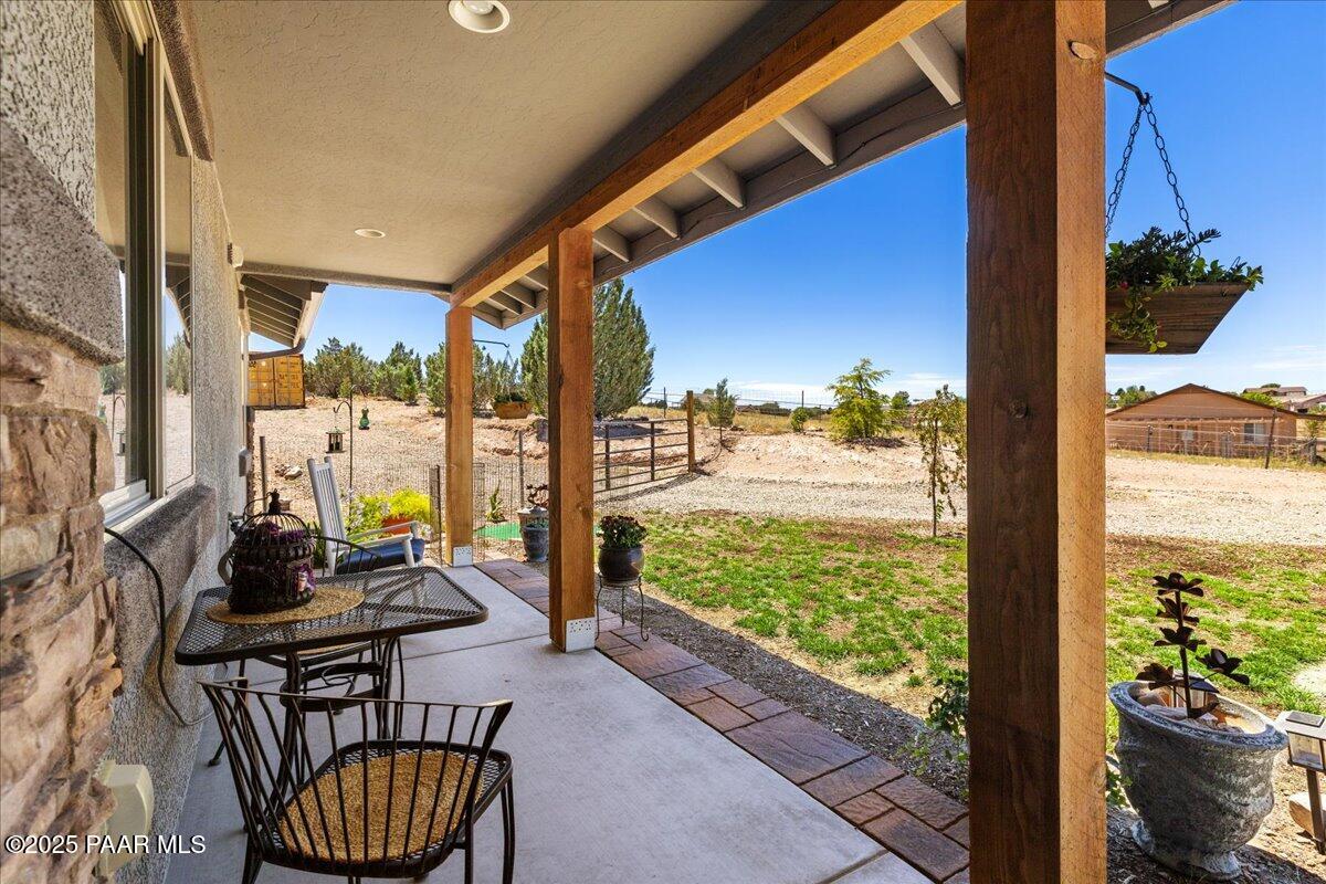 1617 Windmill Way Chino Valley, AZ 86323 - Photo 4 of 42 a view of an chairs and table in the balcony